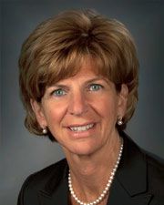 Deborah Schiff wearing a dark suit